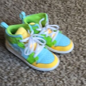 Nike Kids Sneakers in Blue, Yellow, and Green
